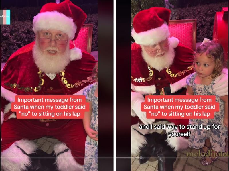 Santa Claus aplaude a una niña que rechaza su regazo