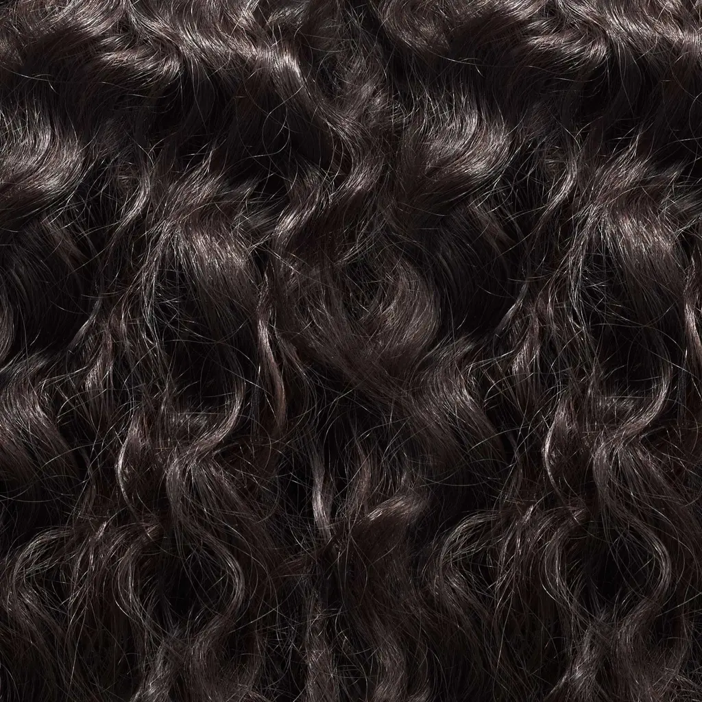 Método Curly para cuidar el cabello chino / Foto: iStock / pharut