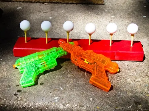 Pistolas de agua con pelotas de golf